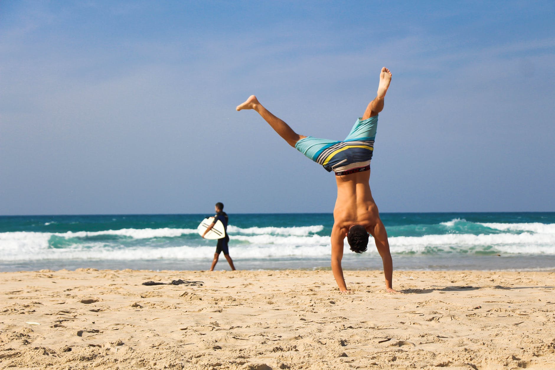 man doing hand stand