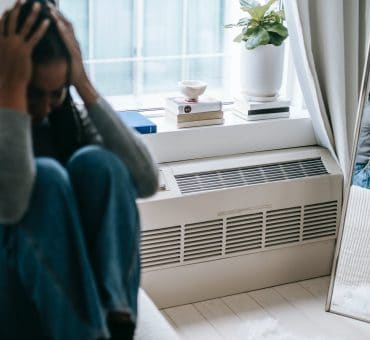 depressed woman having headache and stress